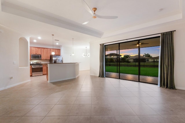 13627 American Prairie Pl, Lakewood Ranch, FL 34211 - unfurnished living room with ceiling fan, a raised ceiling, light tile patterned floors, recessed lighting, and ornamental molding