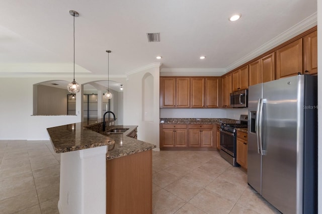 13627 American Prairie Pl, Lakewood Ranch, FL 34211 - kitchen featuring stainless steel appliances, a sink, arched walkways, light tile patterned flooring, and ornamental molding