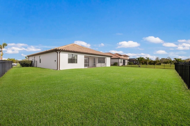 13627 American Prairie Pl, Lakewood Ranch, FL 34211 - rear view of house featuring a tiled roof and stucco siding