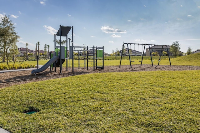 view of play area featuring a lawn