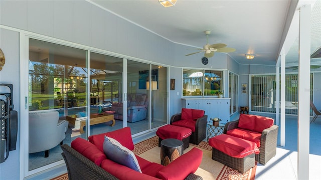 view of patio / terrace with ceiling fan and an outdoor living space