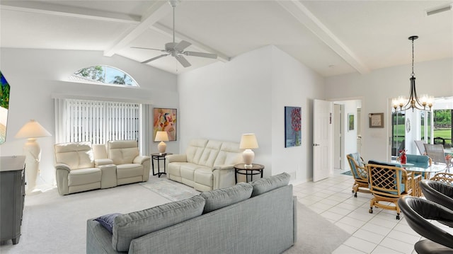 living room with beamed ceiling, ceiling fan with notable chandelier, high vaulted ceiling, and light tile patterned flooring