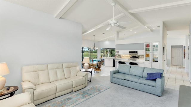 living room with beam ceiling, light tile patterned flooring, ceiling fan with notable chandelier, and high vaulted ceiling