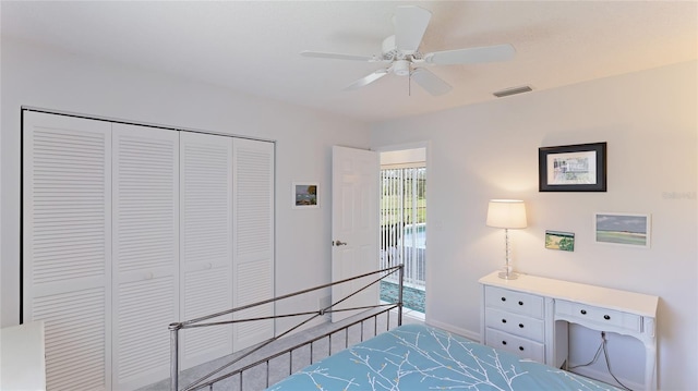 bedroom featuring ceiling fan and a closet