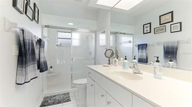 bathroom featuring tile patterned floors, vanity, an enclosed shower, and toilet