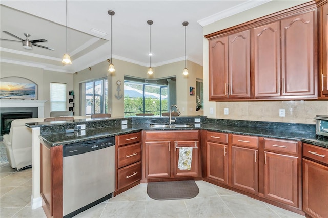 kitchen with pendant lighting, dishwasher, ornamental molding, and sink