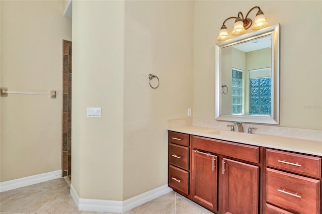 bathroom with tile patterned floors and vanity