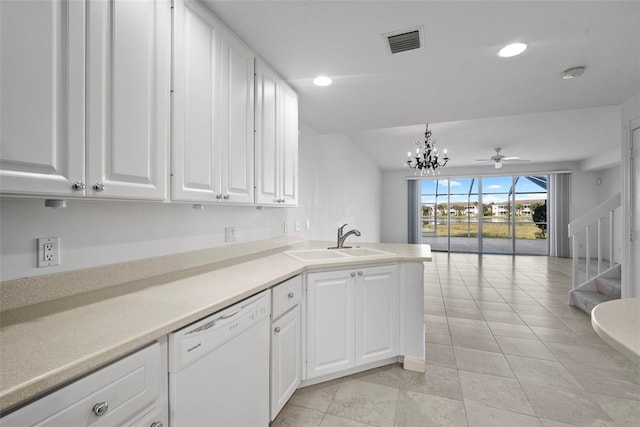 kitchen with ceiling fan with notable chandelier, dishwasher, white cabinets, and decorative light fixtures