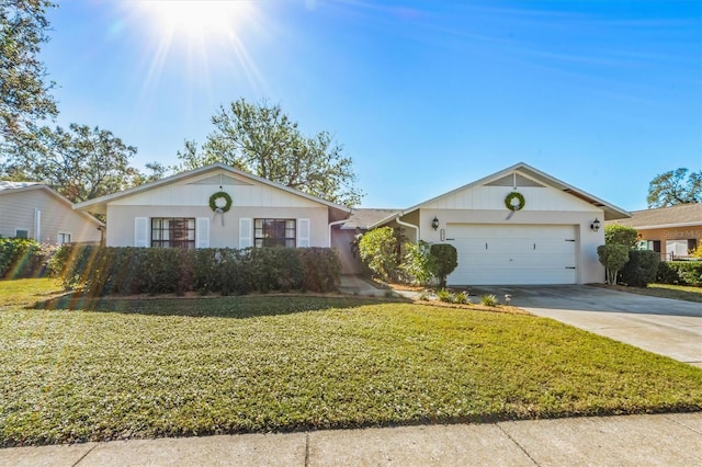 single story home with a front lawn and a garage