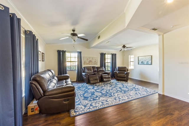 living room featuring crown molding, dark hardwood / wood-style flooring, and ceiling fan