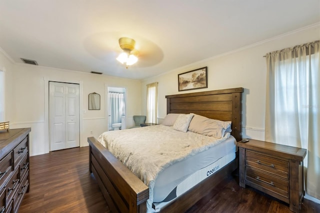 bedroom with multiple windows, ceiling fan, crown molding, and dark wood-type flooring