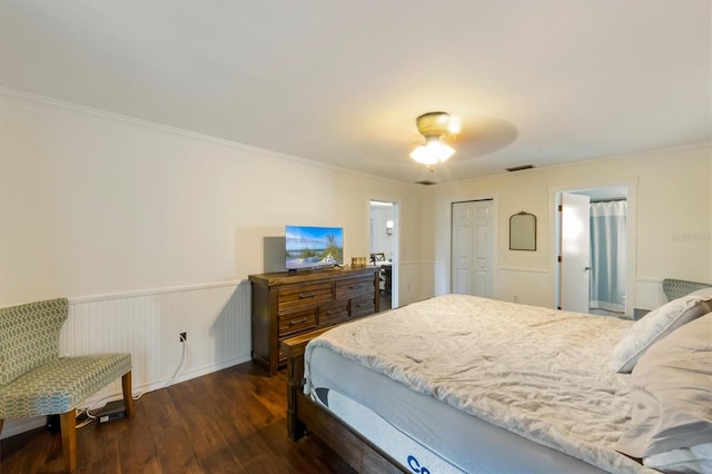 bedroom with ceiling fan, dark hardwood / wood-style flooring, and crown molding