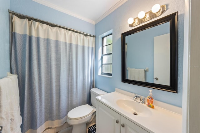 bathroom with toilet, vanity, and ornamental molding