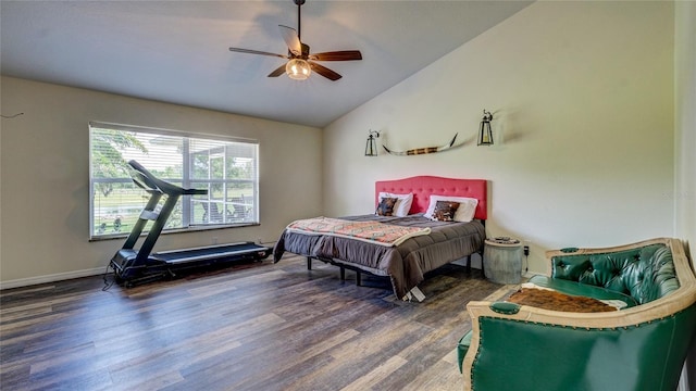 bedroom featuring dark hardwood / wood-style flooring, ceiling fan, and lofted ceiling