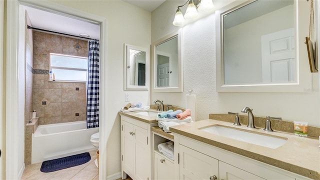 full bathroom with shower / bath combo with shower curtain, tile patterned flooring, vanity, and toilet