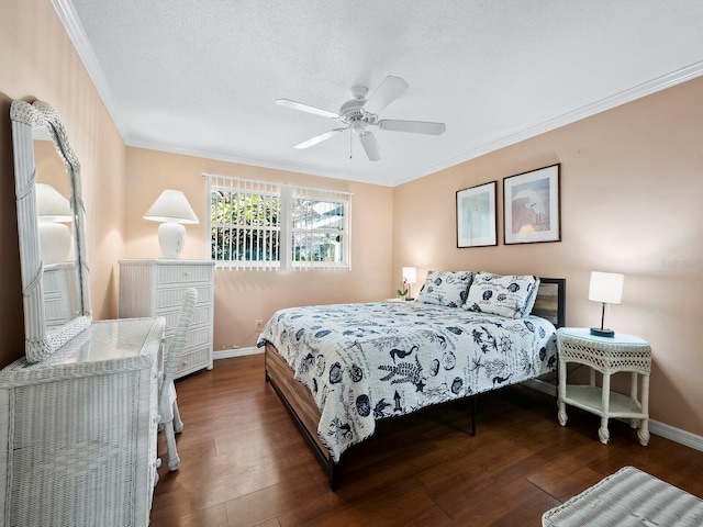 bedroom featuring a textured ceiling, ceiling fan, ornamental molding, and dark wood-type flooring