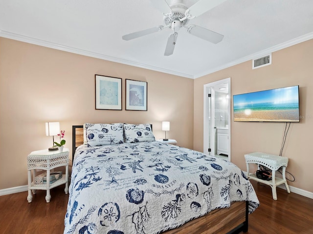 bedroom featuring ceiling fan, dark hardwood / wood-style floors, ornamental molding, and ensuite bathroom