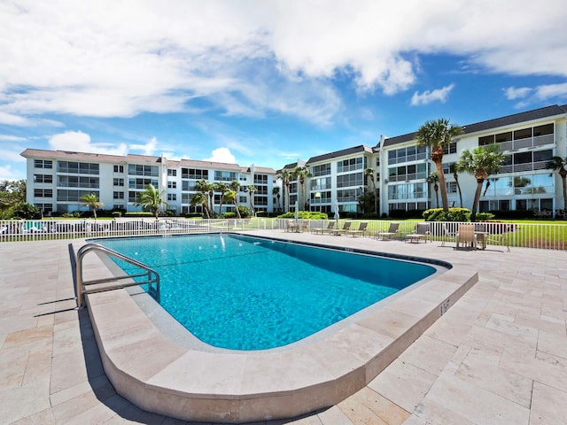 view of pool featuring a patio