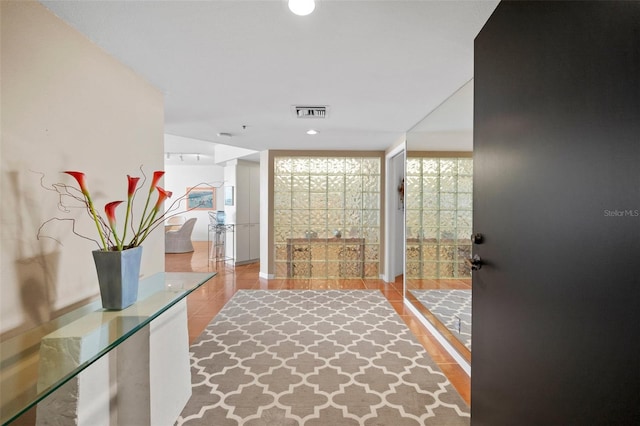 interior space with ornate columns and tile patterned flooring