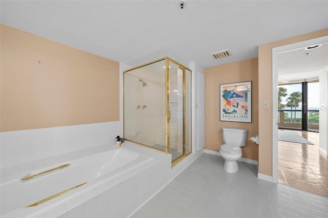 bathroom with toilet, shower with separate bathtub, and tile patterned floors