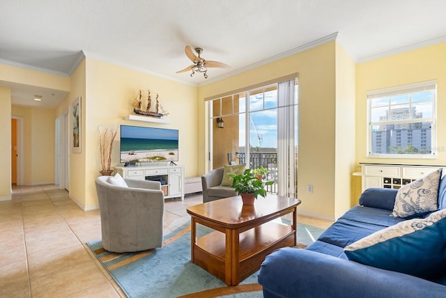 tiled living room with crown molding, ceiling fan, and a healthy amount of sunlight