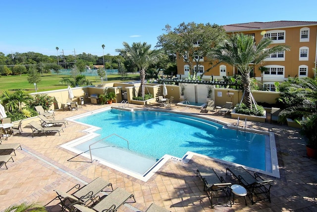 view of pool with a patio