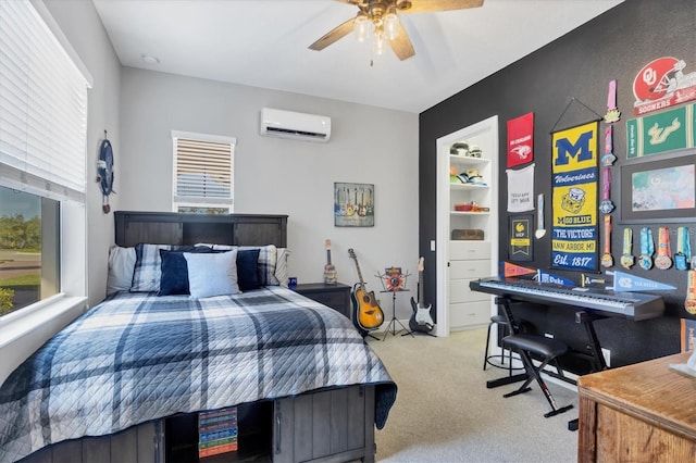 bedroom featuring light colored carpet, a wall mounted AC, and ceiling fan