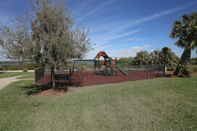 view of jungle gym with a lawn