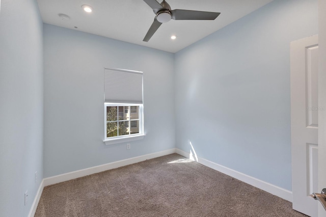 empty room with carpet and ceiling fan