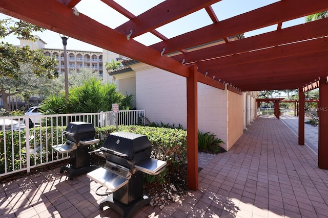 view of patio / terrace featuring a pergola and grilling area