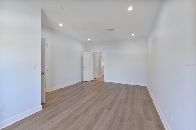 empty room with light wood-type flooring