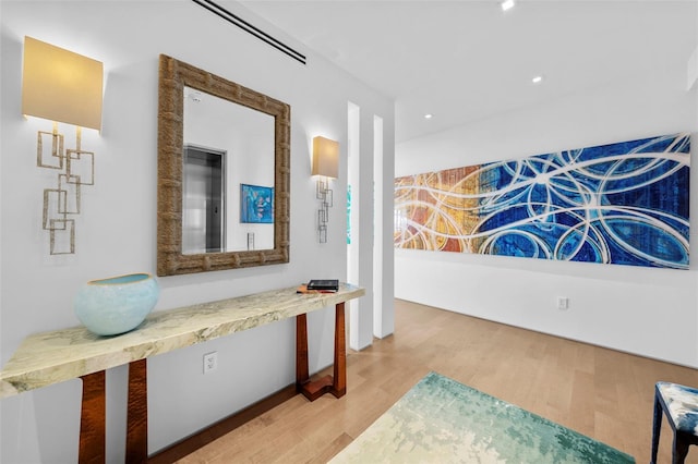 hallway featuring light hardwood / wood-style flooring