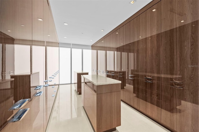 walk in closet featuring light tile patterned floors