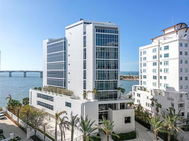 view of property with a water view