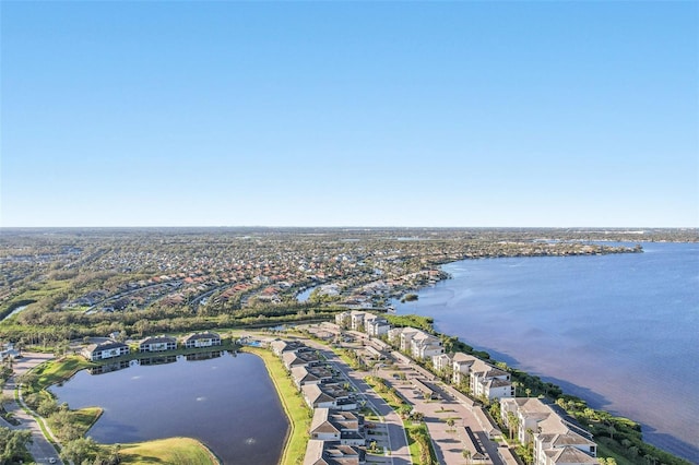 aerial view with a water view and a residential view