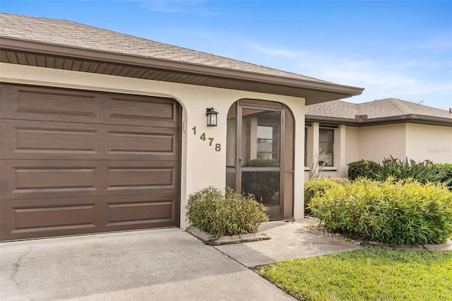 property entrance featuring a garage