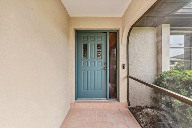 property entrance featuring a balcony