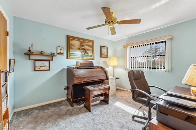 carpeted office with ceiling fan