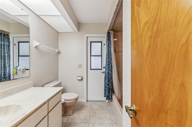 full bathroom with tile patterned floors, toilet, vanity, and shower / bathtub combination with curtain