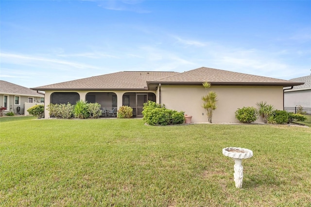 ranch-style home featuring a front yard