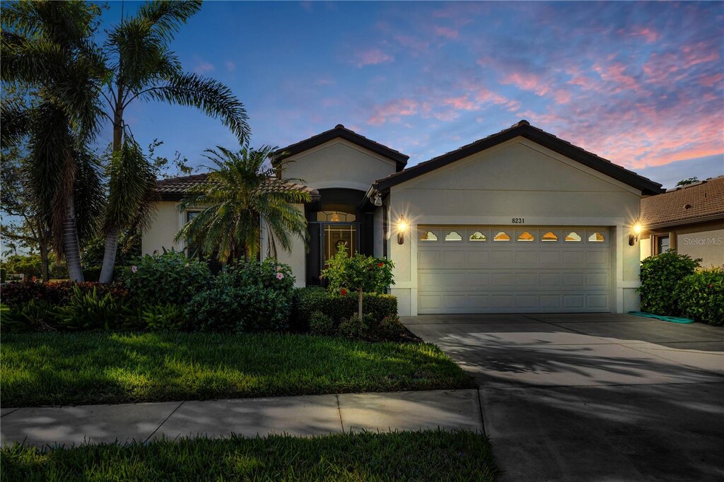 view of front of property with a garage