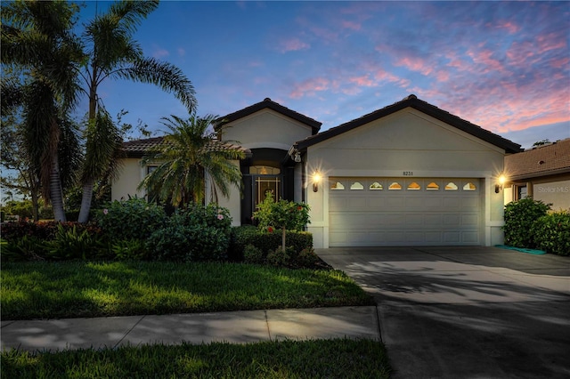 view of front of property with a garage