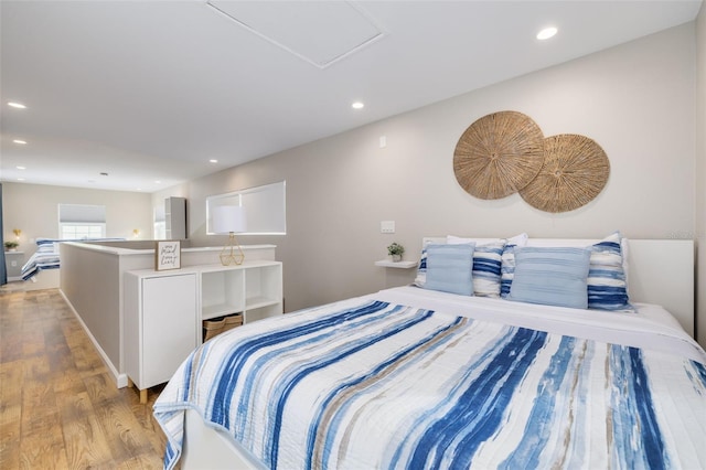 bedroom featuring light wood-type flooring