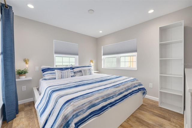 bedroom featuring light wood-type flooring