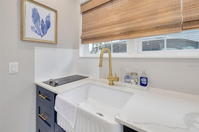 washroom with wood ceiling and sink