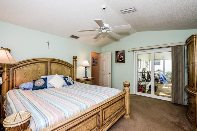 bedroom with a textured ceiling, visible vents, access to exterior, vaulted ceiling, and dark carpet