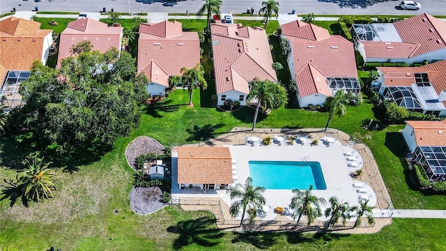 aerial view of residential area with a pool