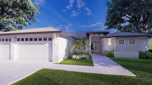 view of front of property with a front yard and a garage