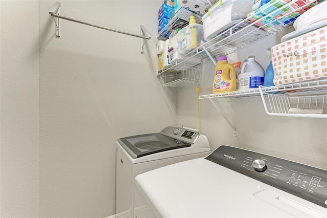 laundry area with washer and clothes dryer