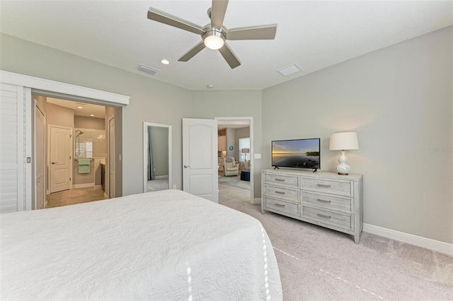 carpeted bedroom with ceiling fan and connected bathroom